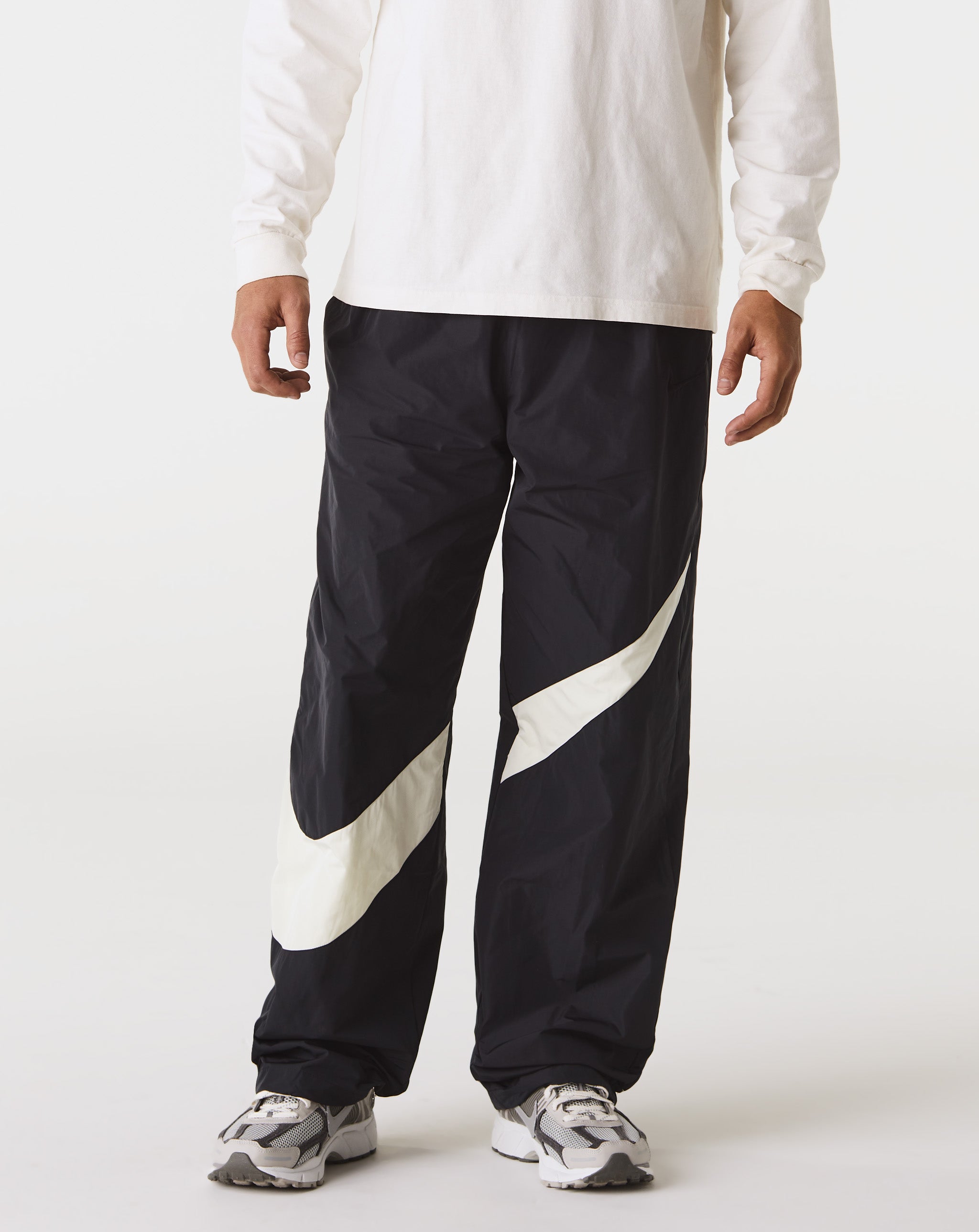 Nike swoosh hotsell woven pants